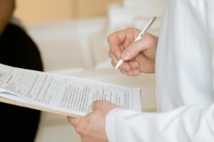 Test results example being filled in by a doctor