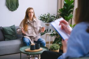 Woman discussing health concerns with naturopathic doctor